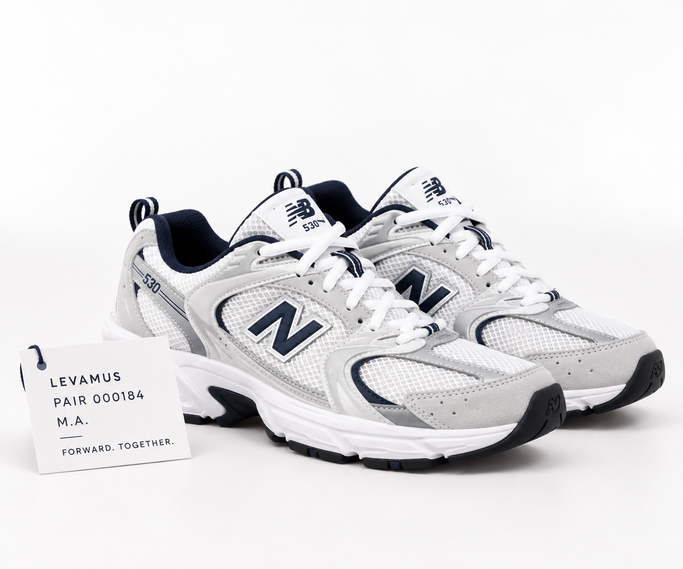 New Balance 530 trainers with Levamus Pair 000184 tag